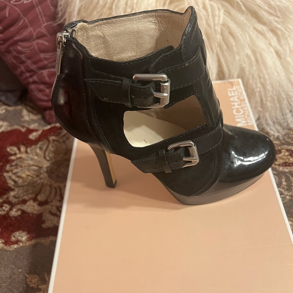 Michael Kors patent leather platform heels. Buckles and ankle height. 
Size 7M - Picture 14 of 16